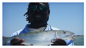 Bonefish Bradley Holding A Fish